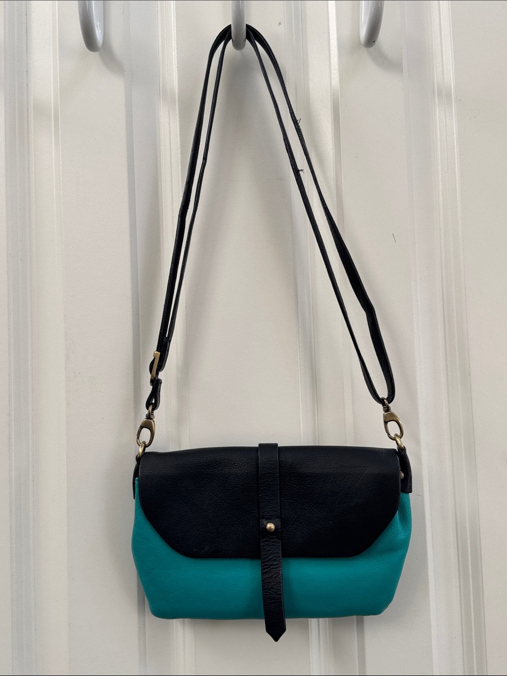 Hadaki Leather Two-Tone Black and Teal Crossbody Bag with Front Adjustable Strap